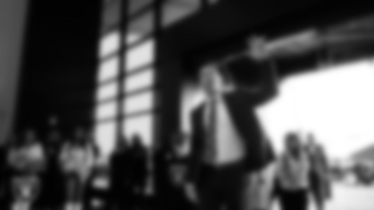 Las Vegas Raiders Head Coach Klint Kubiak is welcomed by alumni, players and staff to Intermountain Health Performance Center.