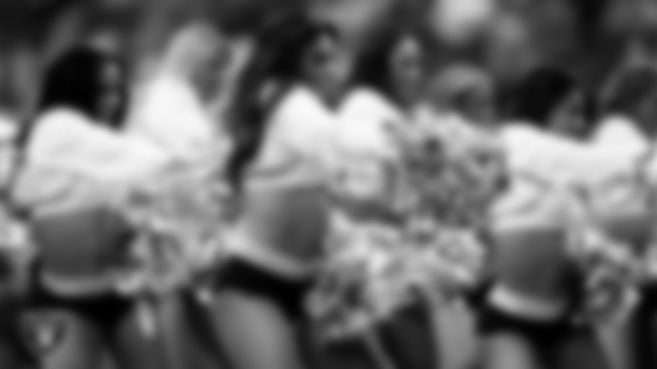 Raiderette Annalise performs on the field during the preseason home game against the San Francisco 49ers at Allegiant Stadium.