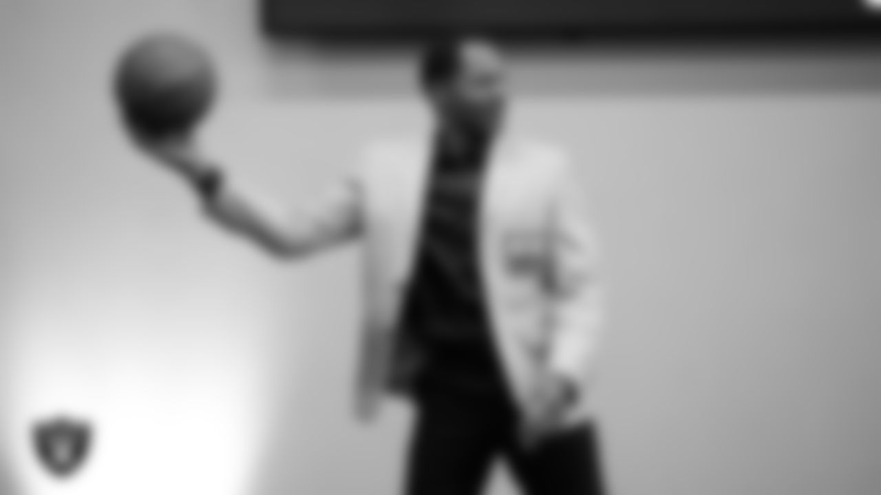 Las Vegas Raiders TV analyst Eric Allen rebounds the ball for the free throw contest during the State of the Team at Intermountain Health Performance Center.