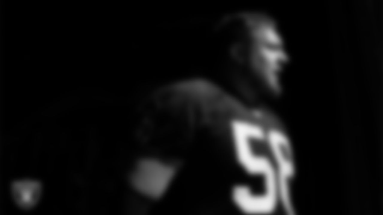 Las Vegas Raiders guard/center Jackson Powers-Johnson (58) walks out to the field for practice at Intermountain Health Performance Center.