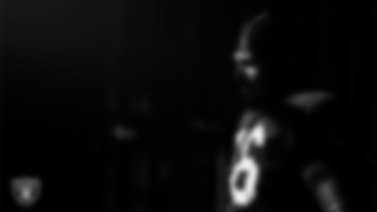 Las Vegas Raiders guard Caleb Rogers (76) walks out to the field for practice at Intermountain Health Performance Center.