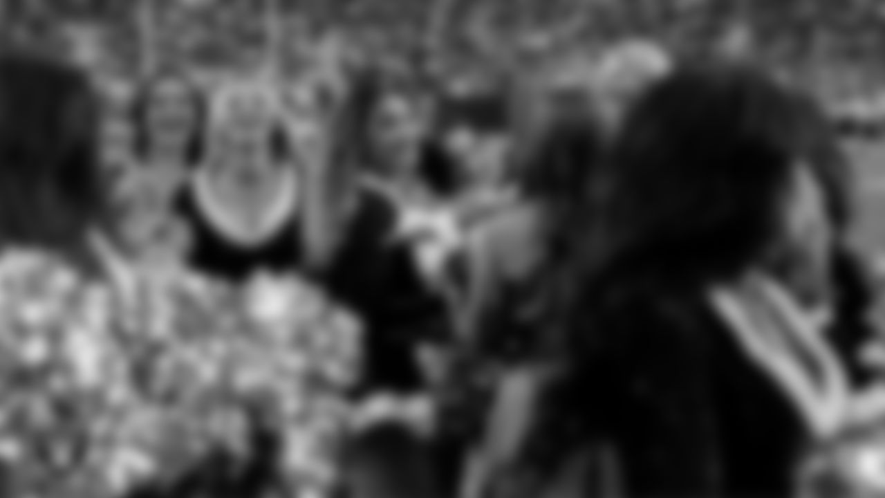 Raiderette Kylie celebrates with teammates after being named Dancer of the Year during the regular season home game against the New York Giants at Allegiant Stadium.