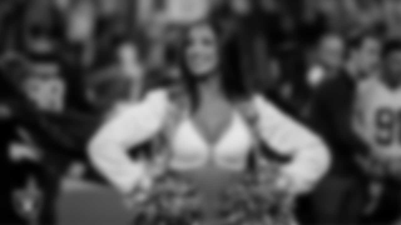 Raiderette Cheyanne during player introductions before the regular season home game against the Dallas Cowboys at Allegiant Stadium.