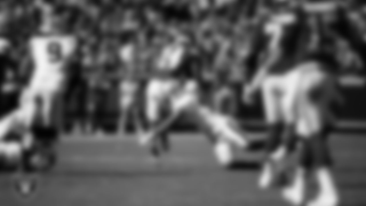 Las Vegas Raiders safety Jeremy Chinn (11) makes a tackle during the regular season away game against the Kansas City Chiefs at GEHA Field at Arrowhead Stadium.