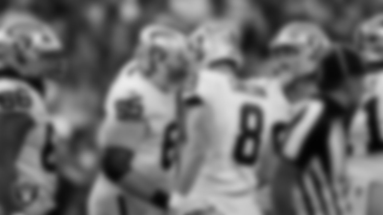 Las Vegas Raiders kicker Daniel Carlson (8) celebrates with guard Alex Cappa (65) after kicking a 24-yard field goal during the regular season away game against the Indianapolis Colts at Lucas Oil Stadium.
