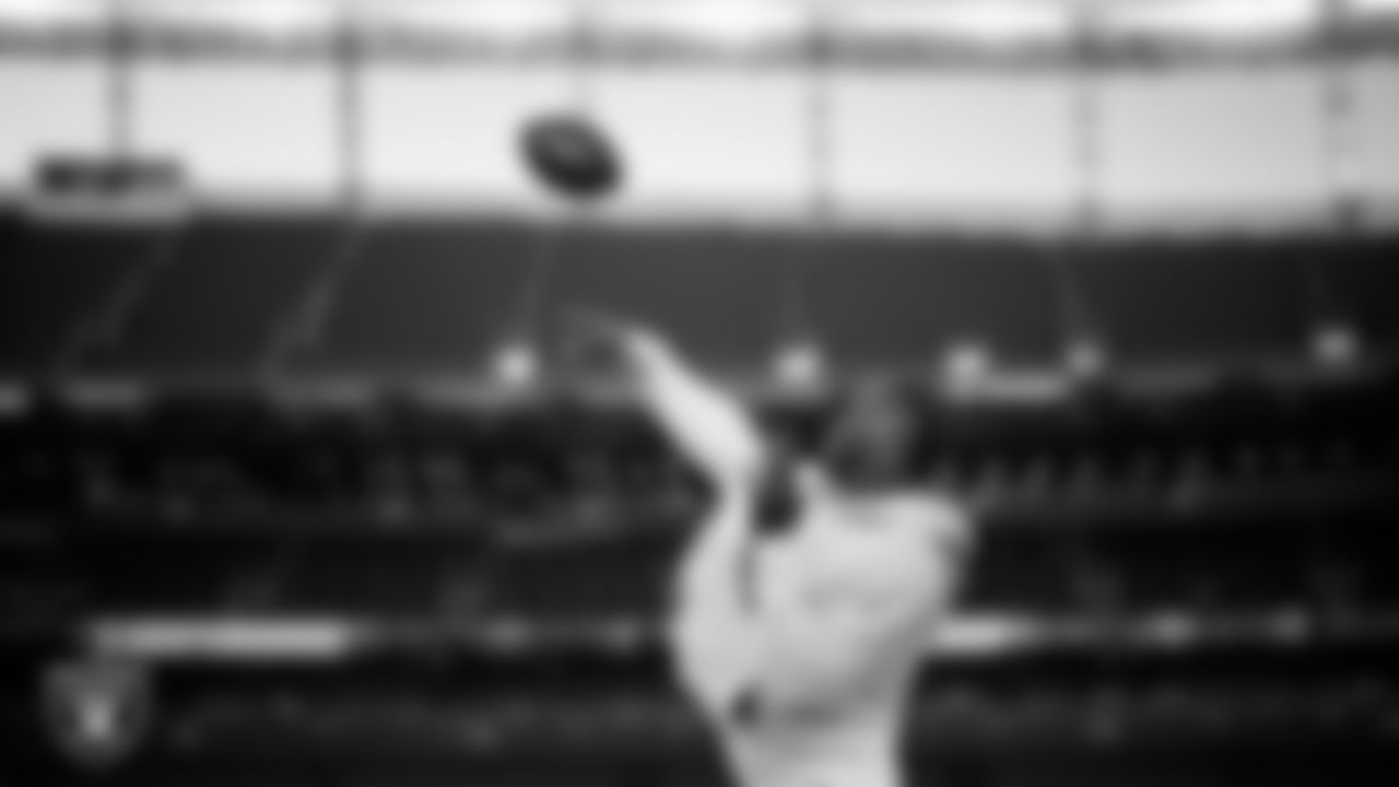 Las Vegas Raiders quarterback Geno Smith (7) warming up before the regular season away game against the Denver Broncos at Empower Field at Mile High.