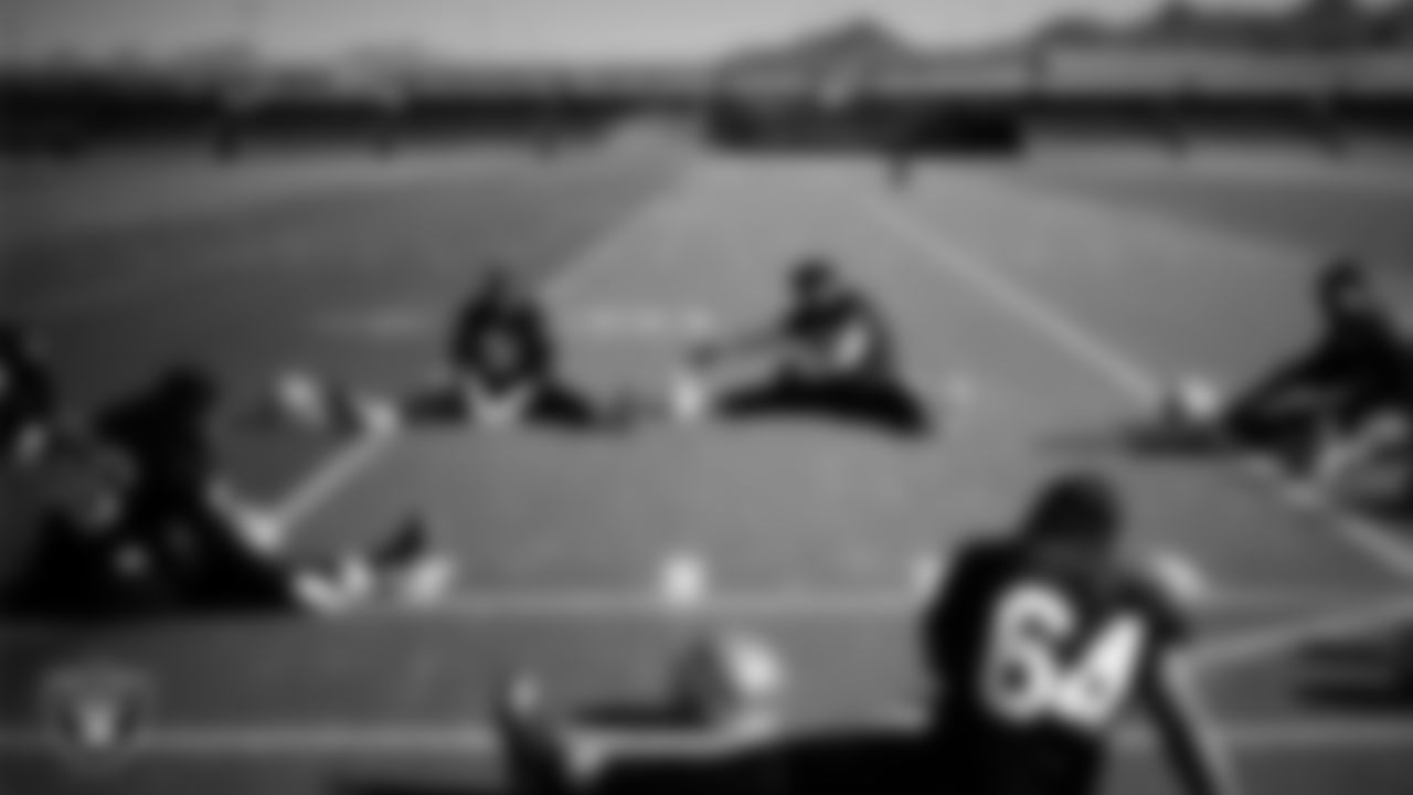 Las Vegas Raiders center/guard Jordan Meredith (61) and guard Caleb Rogers (76) during practice at Intermountain Health Performance Center.