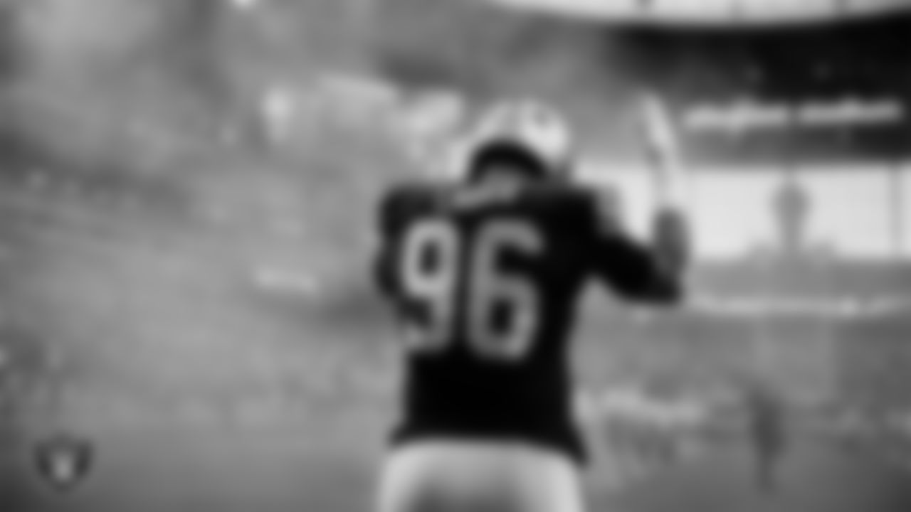 Las Vegas Raiders defensive tackle Jonah Laulu (96) is introduced onto the field before the regular season home game against the Denver Broncos at Allegiant Stadium.