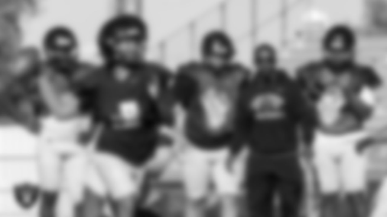 Members of the Desert Oasis High School football team during practice at Desert Oasis High School.