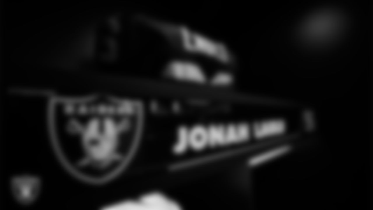 Las Vegas Raiders defensive tackle Jonah Laulu's (96) locker in the locker room prior to the Raiders' arrival for their regular season home game against the Denver Broncos at Allegiant Stadium.