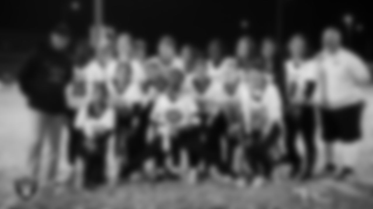 The SLAM! Nevada flag football team poses for a photo after Las Vegas Raiders' High School Flag Football Showcase game at Russel Road Recreational Complex.