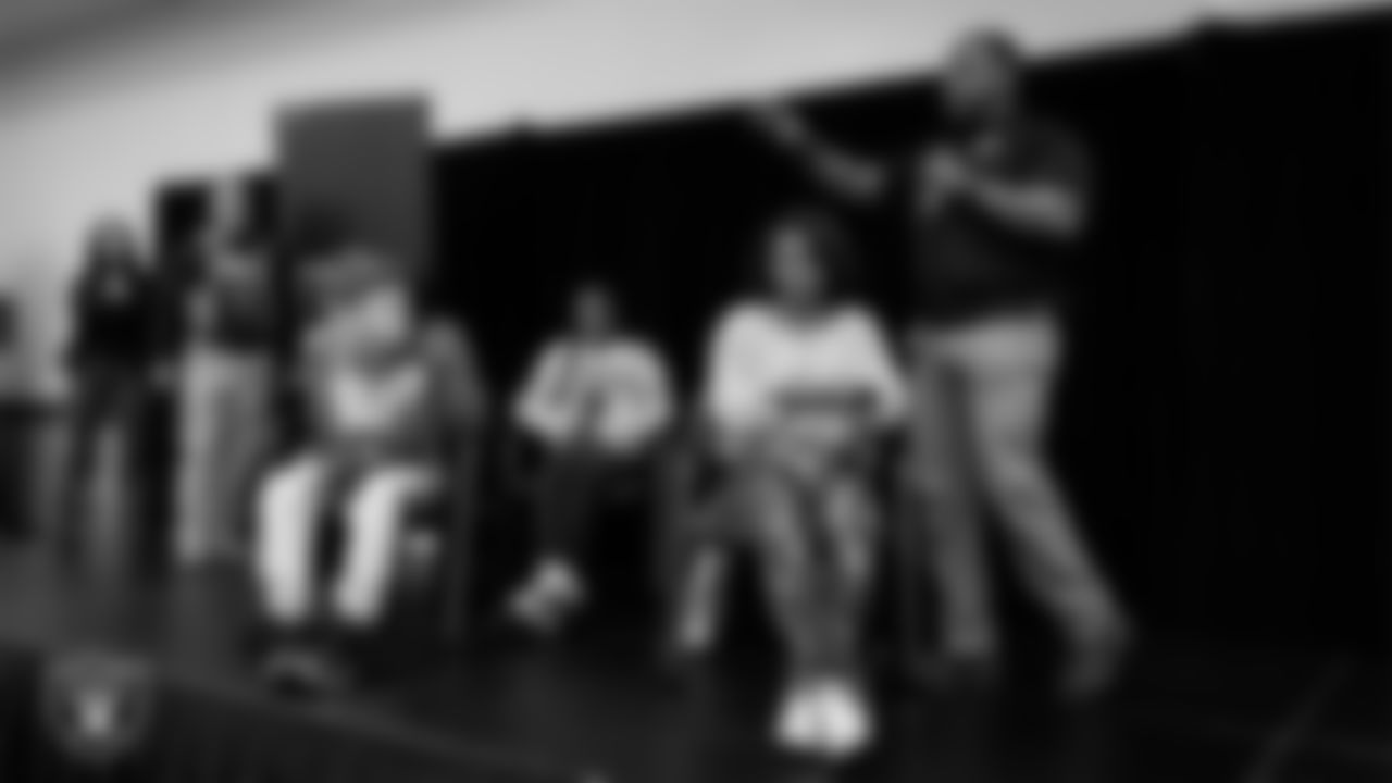 Officers and youth community members work through a scenario regarding what to do when pulled over for a traffic stop during "The Talk" at the Culinary Academy of Las Vegas.
