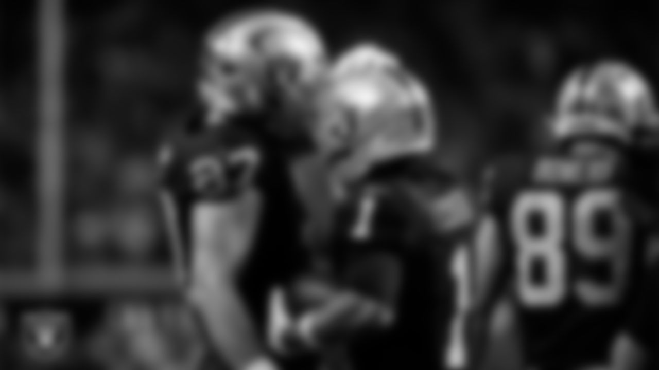 Las Vegas Raiders wide receiver Tre Tucker (1) celebrates with tight end Michael Mayer (87) after making a 6-yard touchdown catch during the regular season home game against the Dallas Cowboys at Allegiant Stadium.