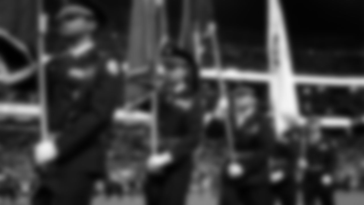 The Rancho High School Air Force JROTC Honor Guard after presenting the nation's colors during the national anthem before the Las Vegas Raiders' regular season home game against the Dallas Cowboys at Allegiant Stadium.