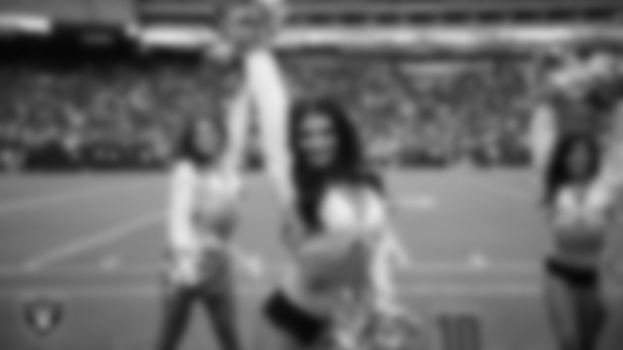 Raiderette Kylee on the sidelines during a 2025 Training Camp mock game at Allegiant Stadium.