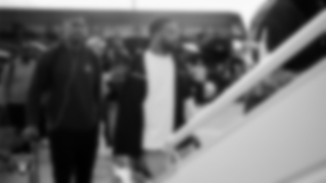 Las Vegas Raiders defensive end Charles Snowden (49) and safety Jeremy Chinn (11) depart for the regular season away game against the Denver Broncos.