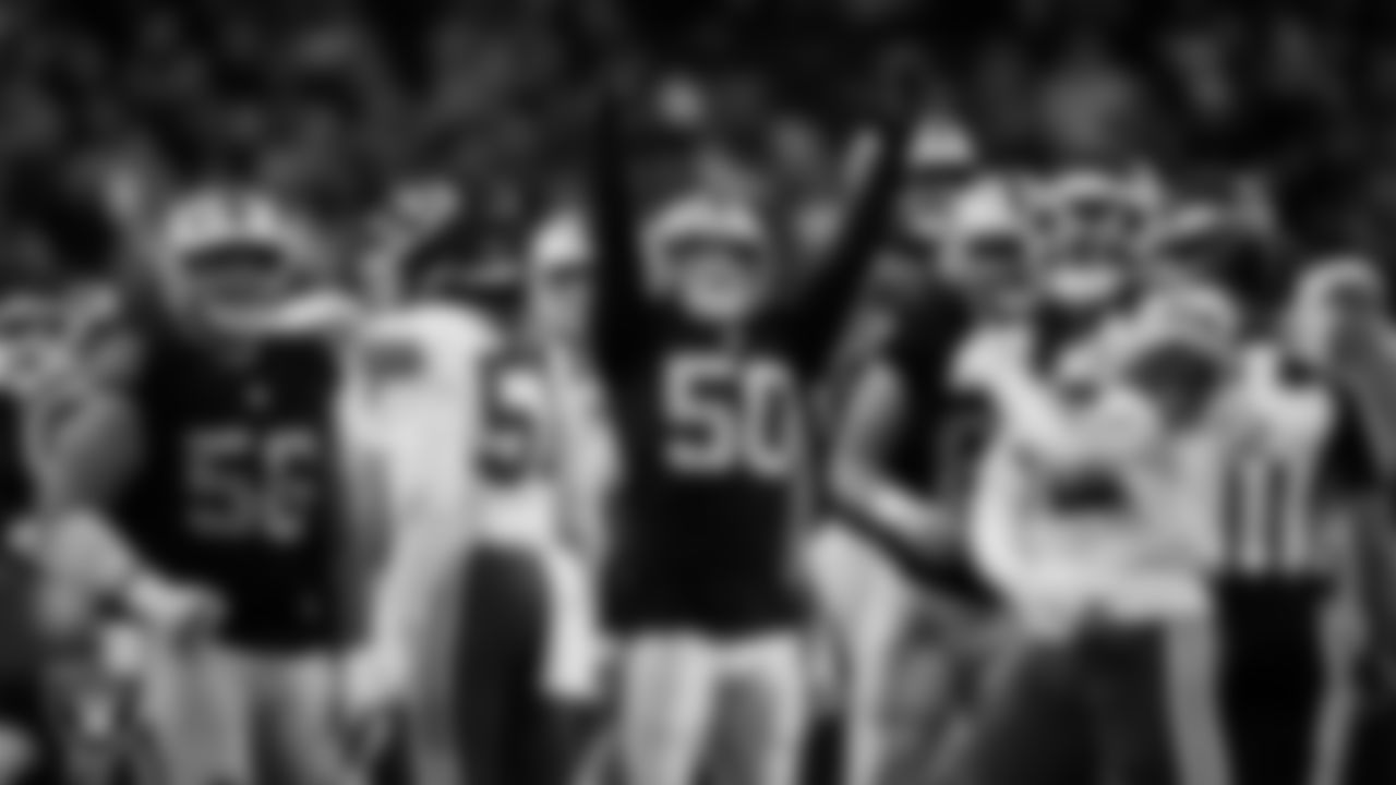 Las Vegas Raiders long snapper Jacob Bobenmoyer (50) celebrates kicker Daniel Carlson's (8) 55-yard field goal during the regular season home game against the Kansas City Chiefs at Allegiant Stadium.