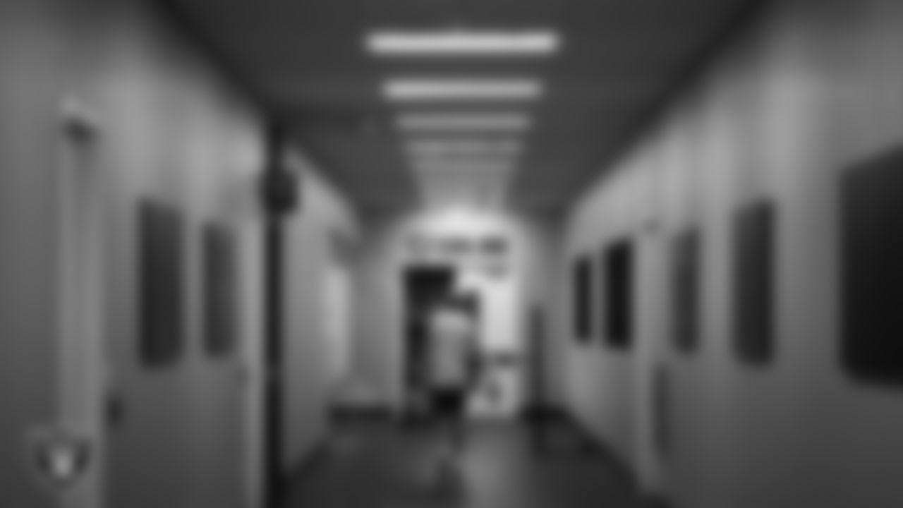 Las Vegas Raiders quarterback Kenny Pickett (15) walks out to the field for practice at Intermountain Health Performance Center.