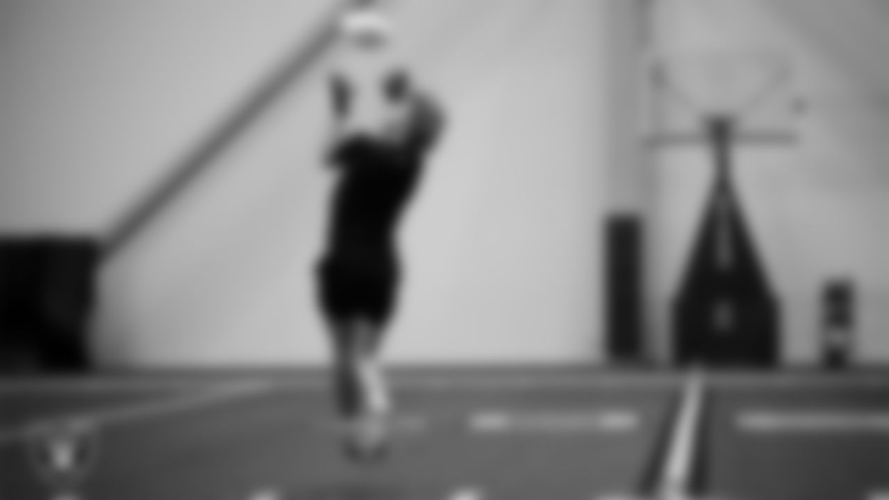 An athlete warms up during practice at Intermountain Health Performance Center.