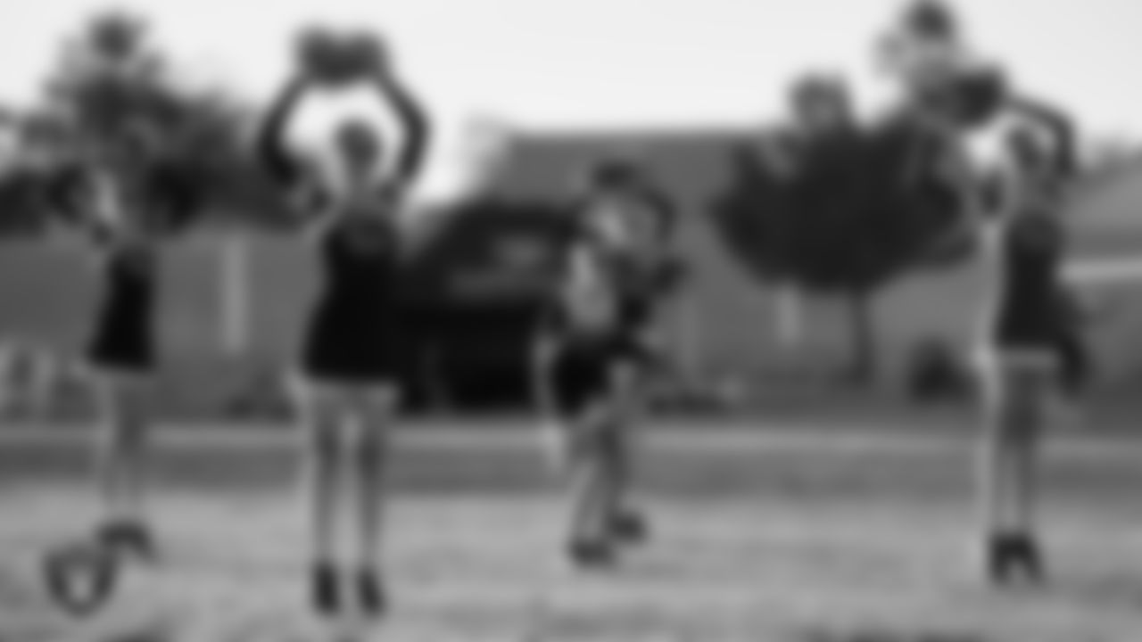 The Ralph Cadwallader Middle School dance team performs during halftime of the Las Vegas Raiders' Middle School Flag Football Showcase game at Ralph Cadwallader Middle School.