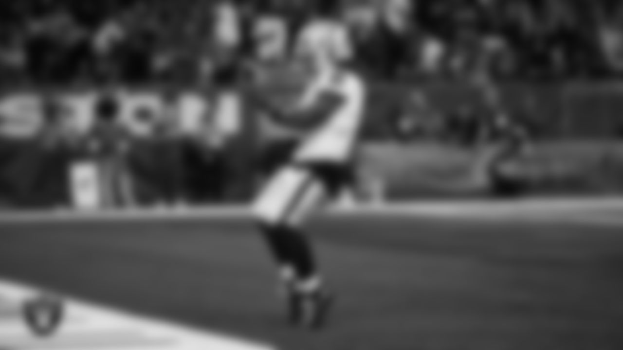 Las Vegas Raiders running back Ashton Jeanty (2) celebrates after making a 60-yard touchdown catch during the regular season away game against the Houston Texans at NRG Stadium.