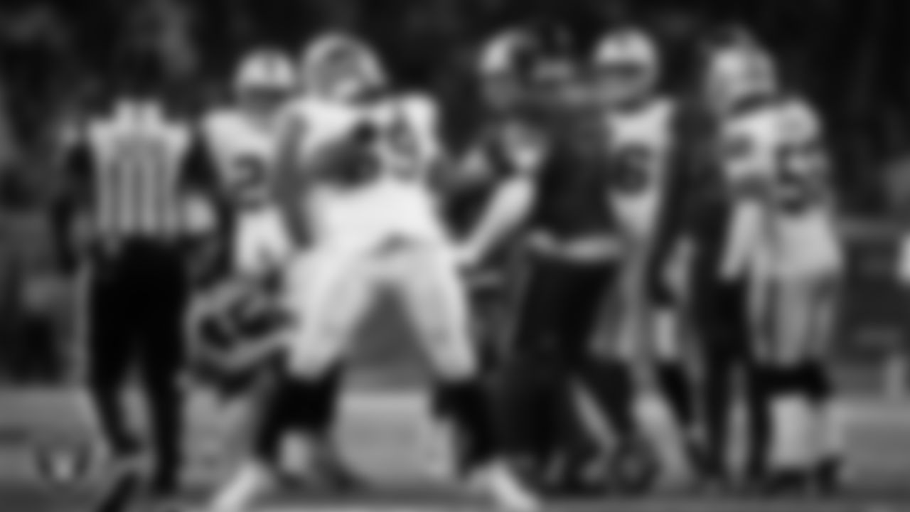 Las Vegas Raiders defensive tackle Adam Butler (69) celebrates after making a tackle during the regular season away game against the Houston Texans at NRG Stadium.