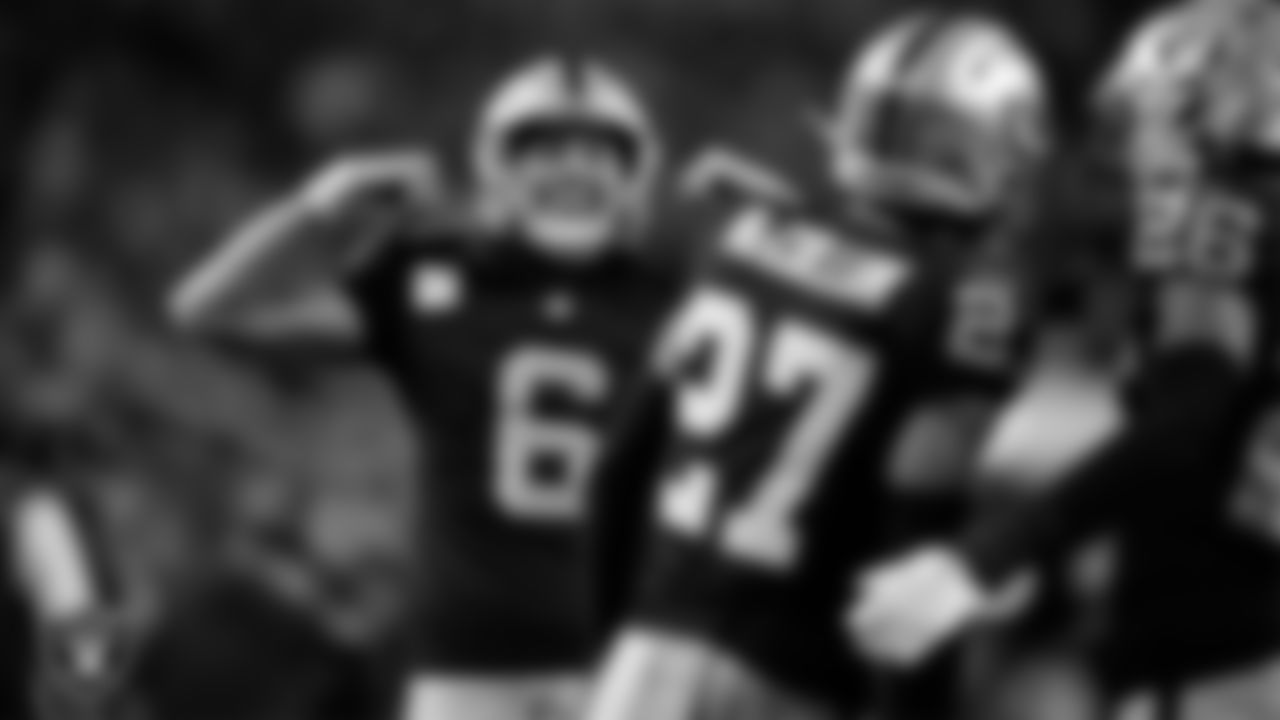 Las Vegas Raiders punter AJ Cole (6) celebrates after punting during the regular season home game against the Dallas Cowboys at Allegiant Stadium.