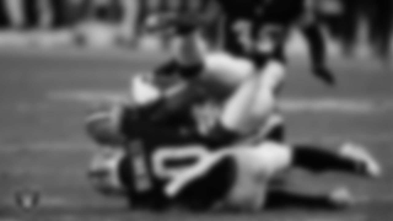 Las Vegas Raiders cornerback Jakorian Bennett (0) makes a tackle during the preseason home game against the Dallas Cowboys at Allegiant Stadium, Saturday, August 17, 2024, in Las Vegas, Nev.