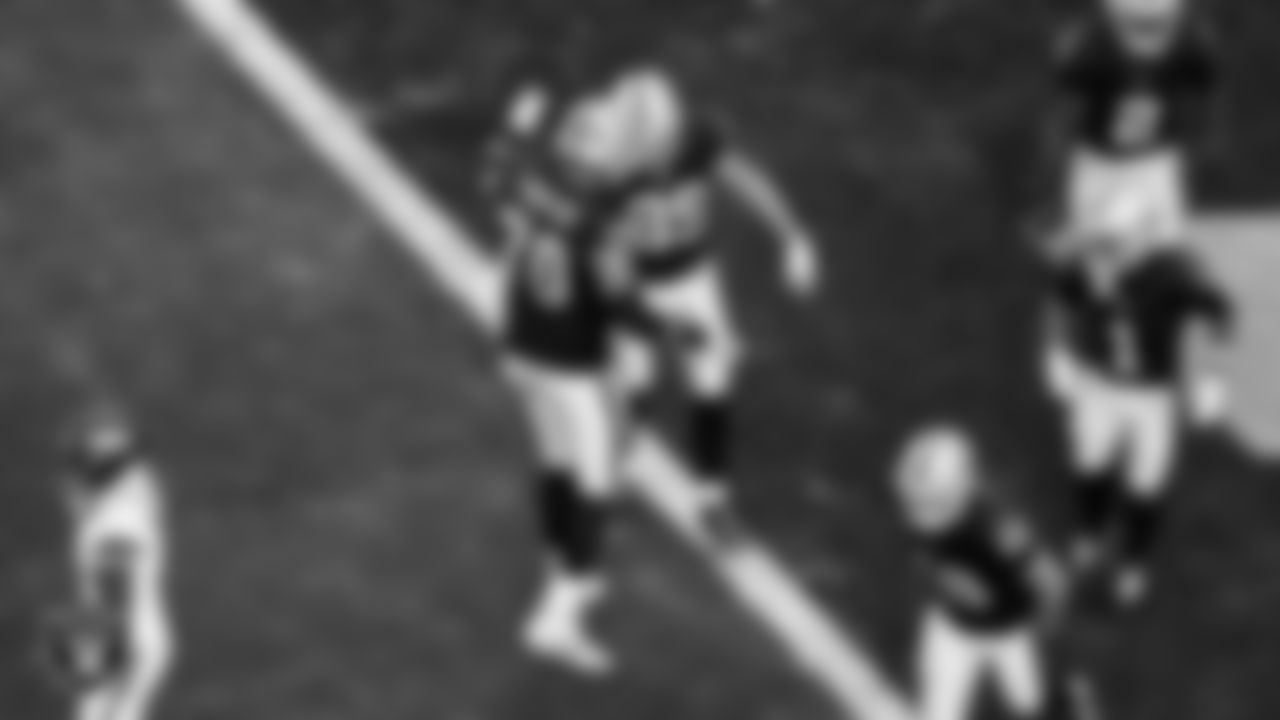 Las Vegas Raiders tight end Brock Bowers (89) celebrates with offensive lineman Stone Forsythe (70) after making a 15-yard touchdown catch during the regular season home game against the Denver Broncos at Allegiant Stadium.