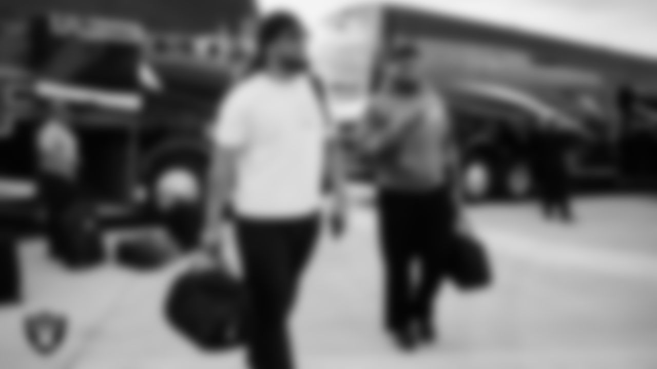 Las Vegas Raiders defensive tackle Leki Fotu (95) and defensive tackle Jonah Laulu (96) depart for the regular season away game against the Denver Broncos.