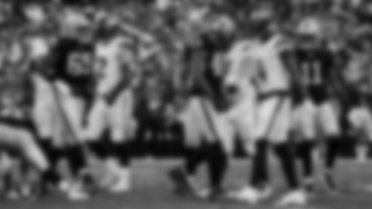 Las Vegas Raiders defensive end Charles Snowden (49) celebrates after making a tackle during the regular season home game against the Denver Broncos at Allegiant Stadium.
