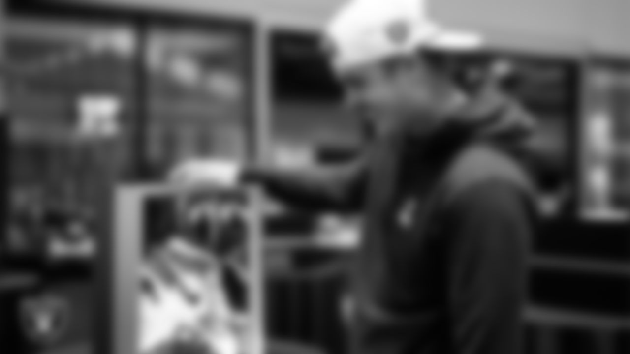 Las Vegas Raiders quarterback Aidan O'Connell (12) unboxes his custom cleats for the NFL's My Cause My Cleats initiative at Intermountain Health Performance Center.