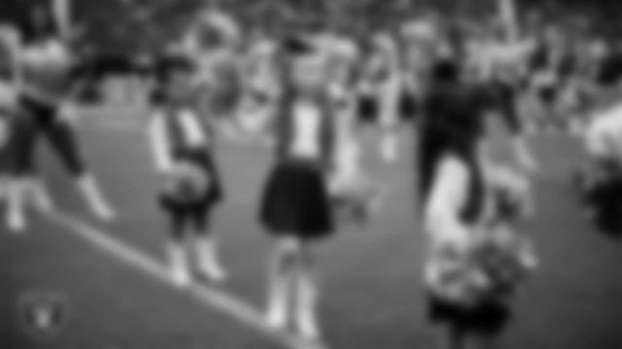 Junior Raiderettes perform on the field before the preseason home game against the San Francisco 49ers at Allegiant Stadium.