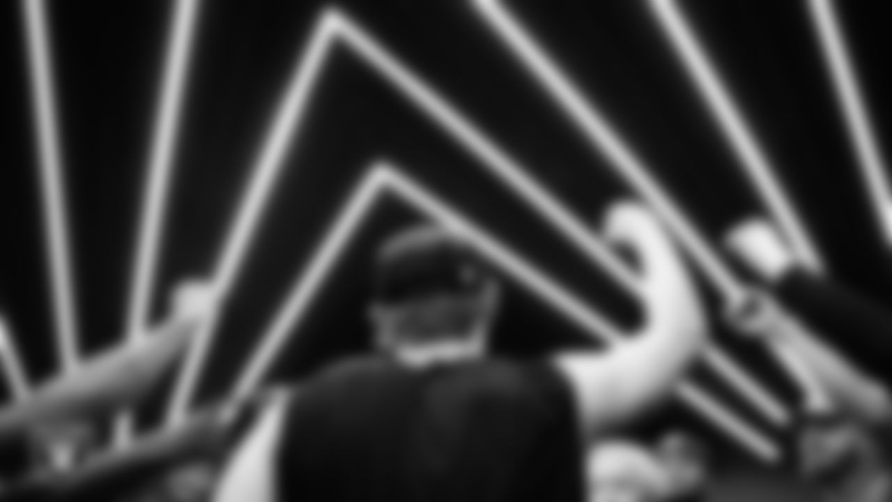 The Las Vegas Raiders huddle in the locker room after the regular season home game against the Kansas City Chiefs at Allegiant Stadium.