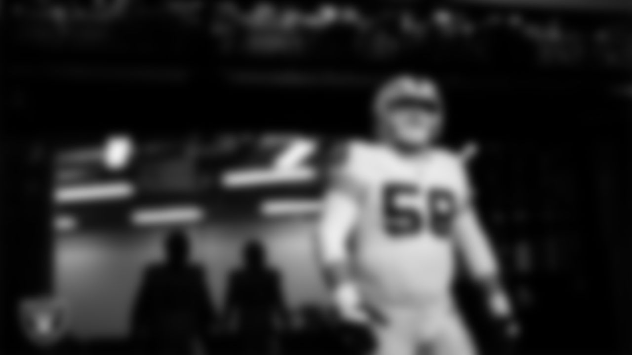 Las Vegas Raiders center Jackson Powers-Johnson (58) walks down the tunnel before the regular season away game against the Indianapolis Colts at Lucas Oil Stadium.