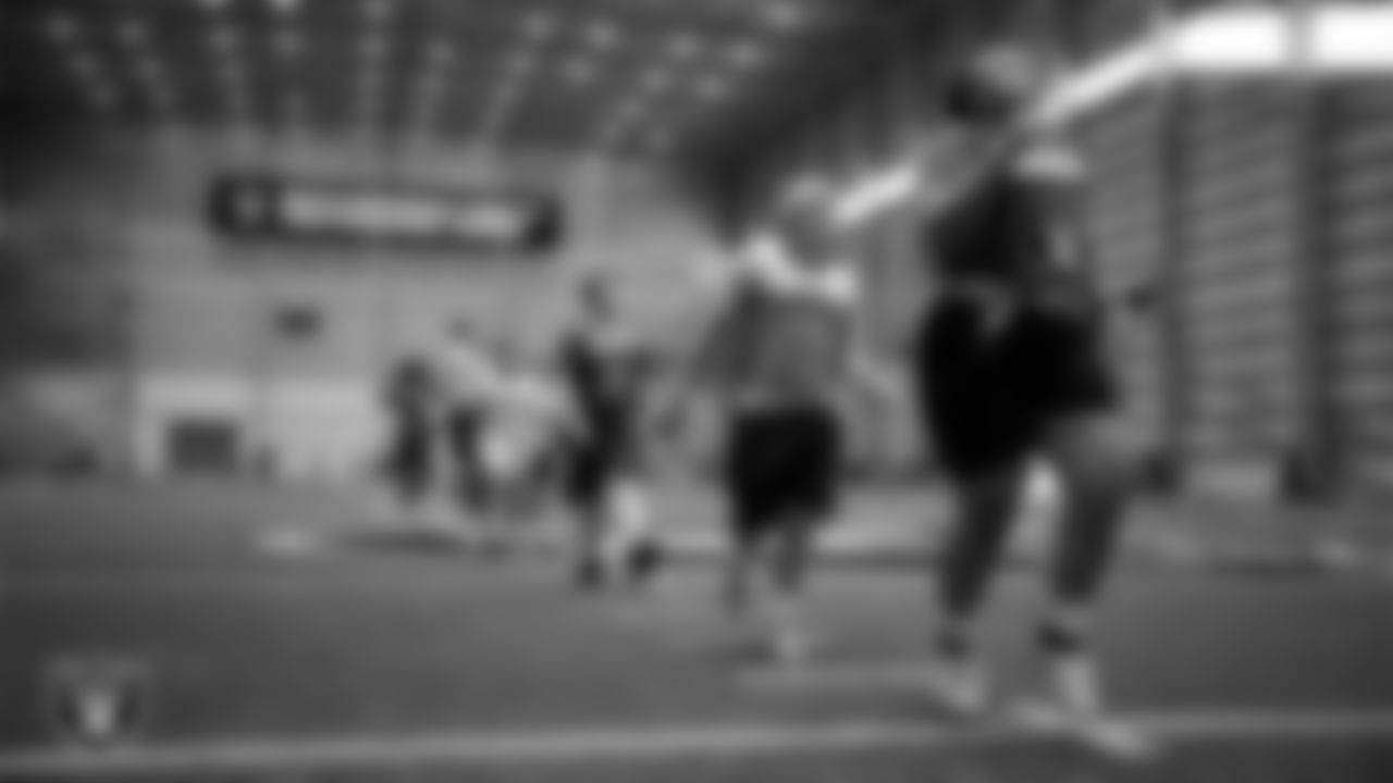 Athletes warm up during practice at Intermountain Health Performance Center.
