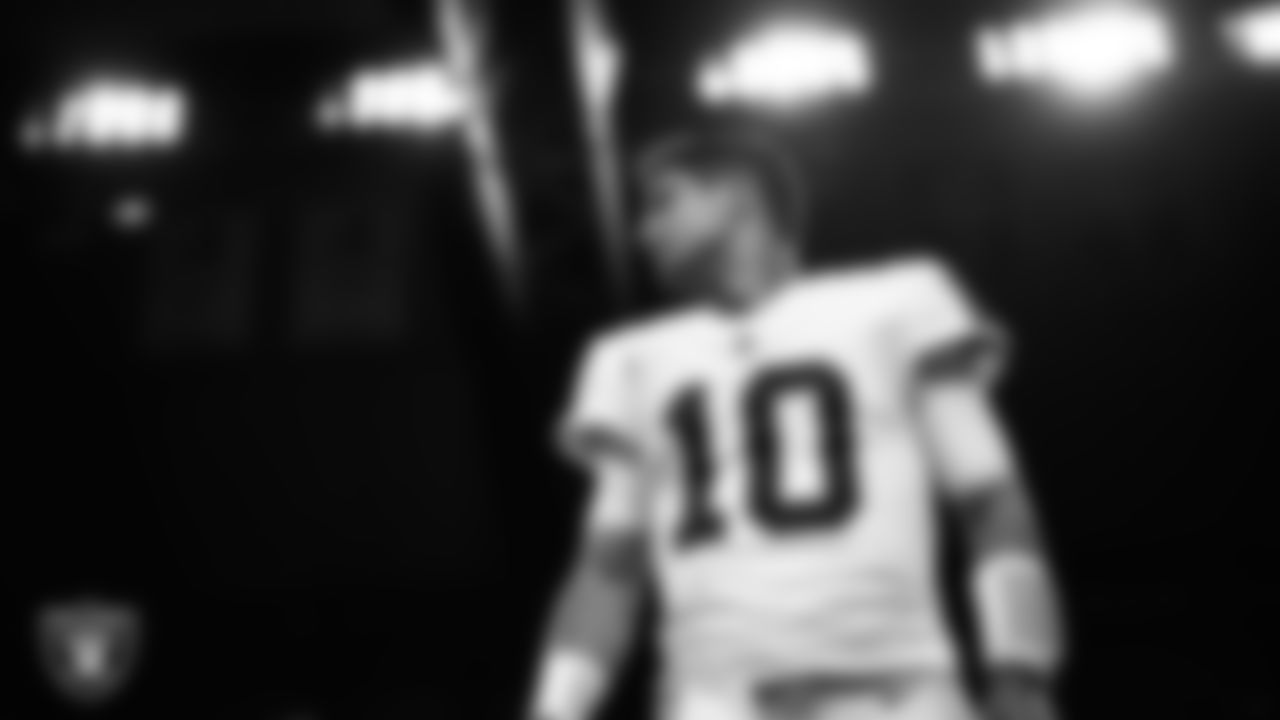 Las Vegas Raiders quarterback Jimmy Garoppolo (10) warming up before the regular season away game against the Detroit Lions at Ford Field.