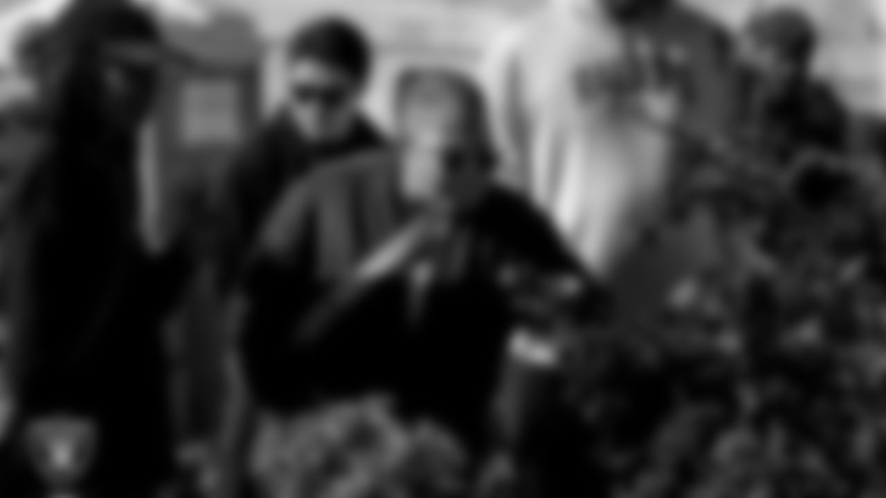 Attendees tour the Obodo Community Gardens during the Historic Westside Tour.