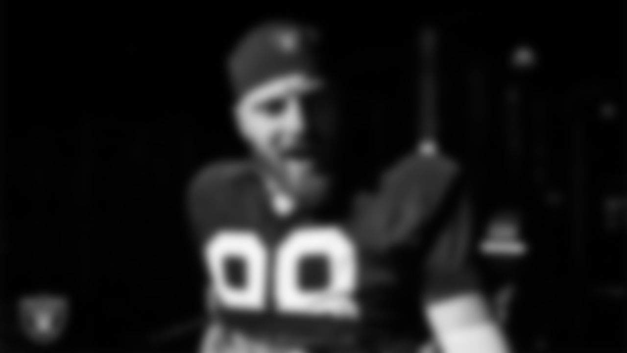 Las Vegas Raiders defensive end Maxx Crosby (98) walks out to the field for practice at Intermountain Health Performance Center.