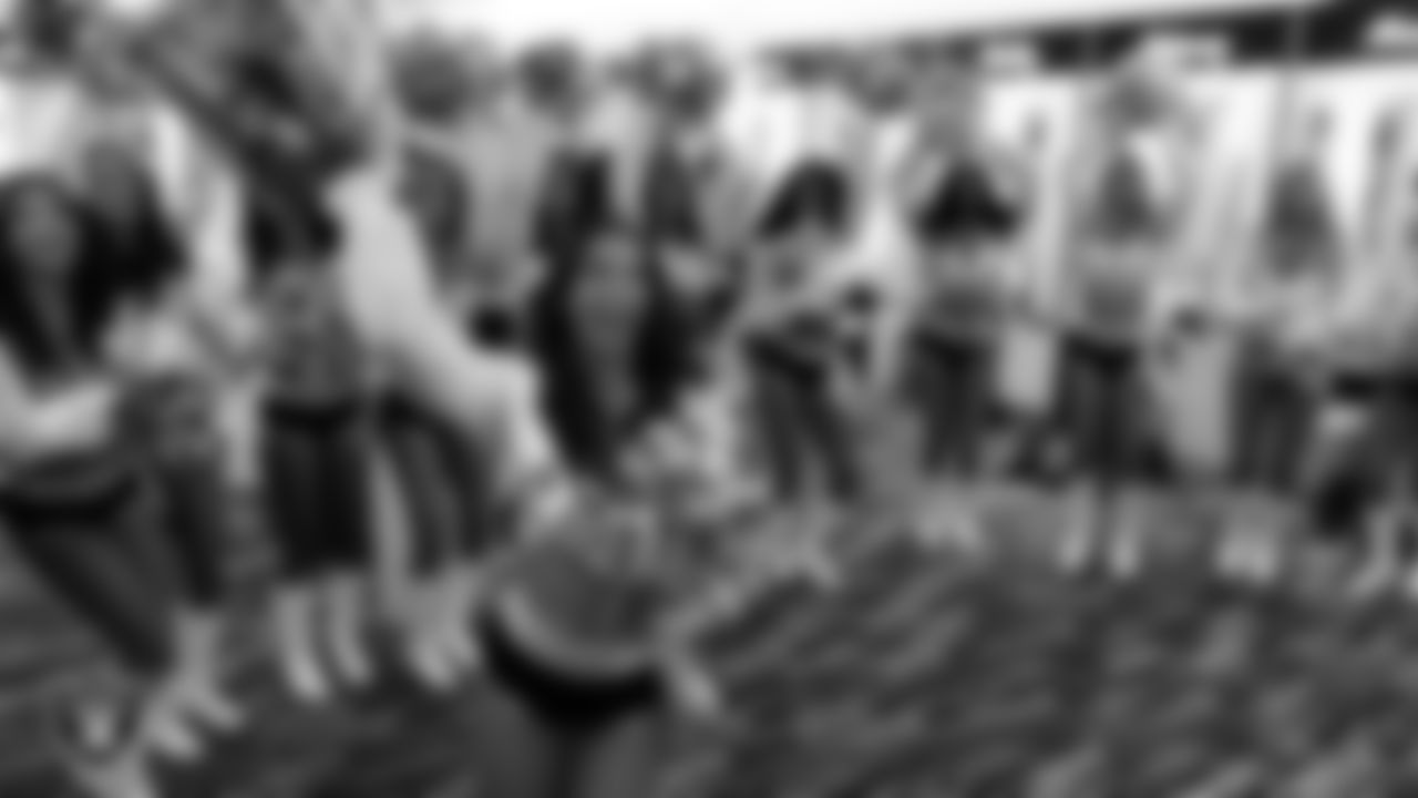 Raiderette Raegen is named Raiderette of the Game in the locker room before the regular season home game against the Denver Broncos at Allegiant Stadium.