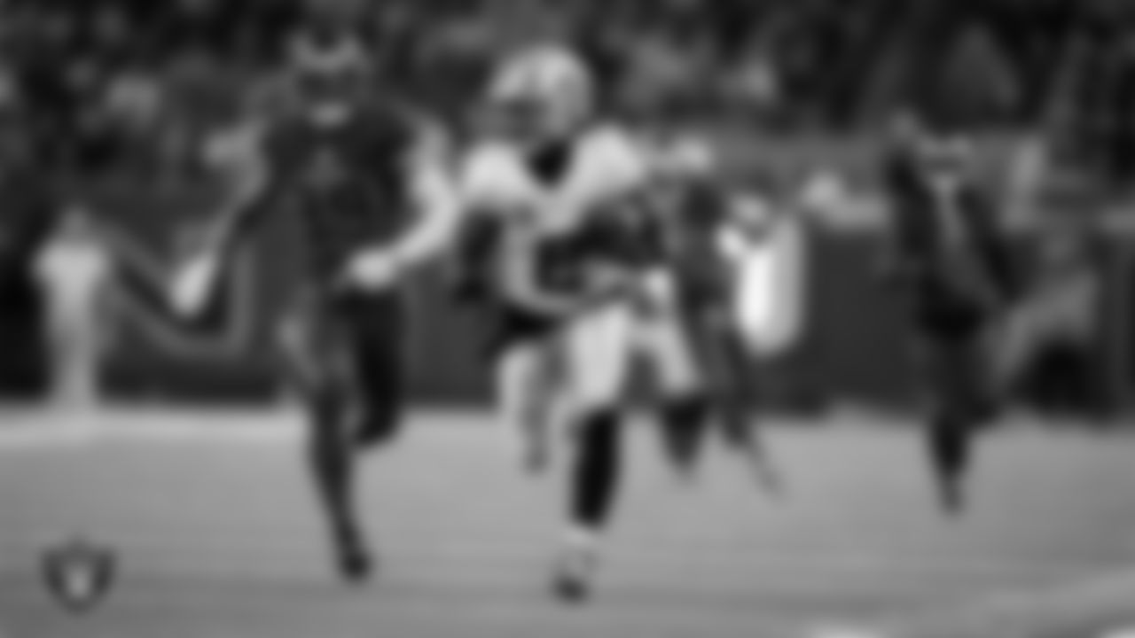 Las Vegas Raiders running back Ashton Jeanty (2) runs after making a 60-yard touchdown catch during the regular season away game against the Houston Texans at NRG Stadium.