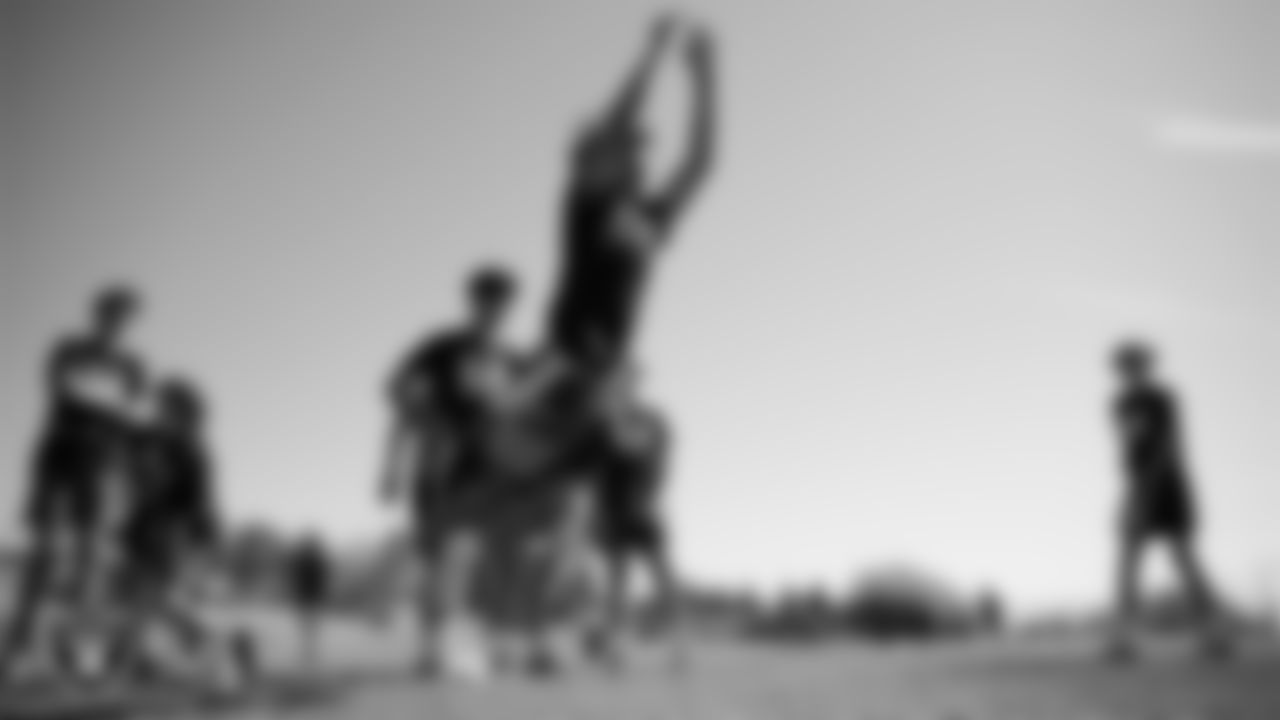 An athlete takes part in a drill after a partnership announcement between the Las Vegas Raiders and Clark County School District as a Silver and Black Flag Football league at the middle school level at Sig Rogich Middle School.