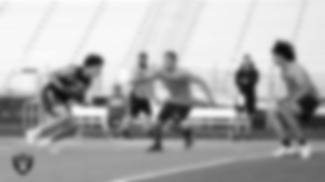 Athletes compete in a 7-on-7 game during a Las Vegas Raiders 11-ON event at Damonte Ranch High School.