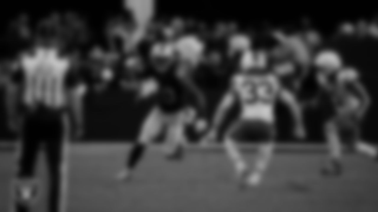 Las Vegas Raiders tight end Ian Thomas (80) runs after making a catch during the regular season home game against the Cleveland Browns at Allegiant Stadium.