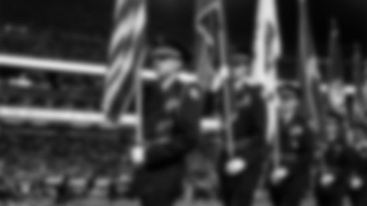 The Rancho High School Air Force JROTC Honor Guard after presenting the nation's colors during the national anthem before the Las Vegas Raiders' regular season home game against the Dallas Cowboys at Allegiant Stadium.