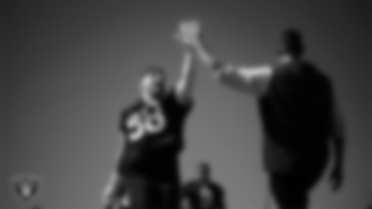 Las Vegas Raiders defensive end Maxx Crosby (98) and Head Coach Pete Carroll at a workout during phase two of the offseason program at Intermountain Health Performance Center.