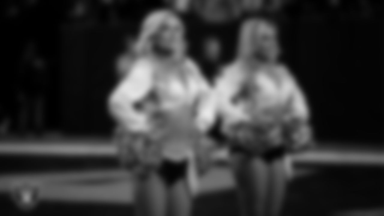 Raiderette Kennedy during player introductions before the regular season home game against the Dallas Cowboys at Allegiant Stadium.