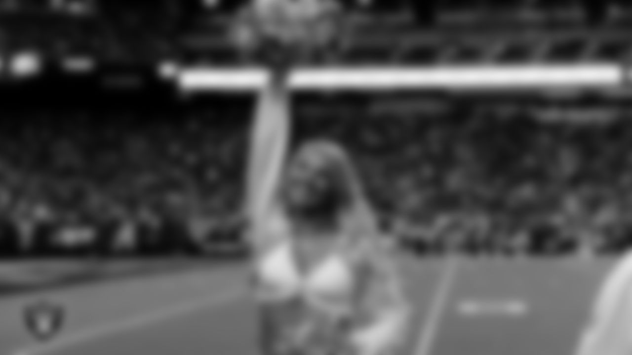 Raiderette Cori on the sidelines during the regular season home game against the Cleveland Browns at Allegiant Stadium.
