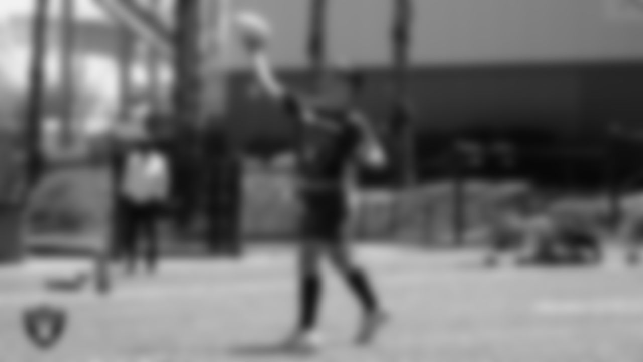 An athlete competes in a Silver and Black Flag Football game at Bill and Lillie Heinrich YMCA.