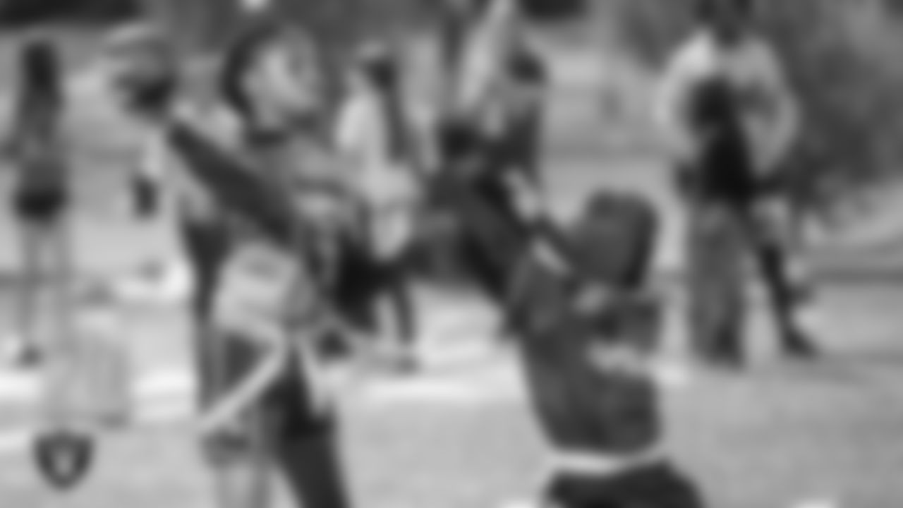 Athletes from the East Division and West Division of the City of Las Vegas Silver and Black Youth Flag Football League compete in the championship game at All American Park.